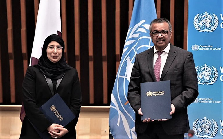 Qatar’s Minister for Public Health Dr. Hanan Mohamed Al Kuwari (left) and WHO Director-General Dr. Tedros Adhanom Ghrebreyesus after exchanging signed documents in Geneva on Monday.