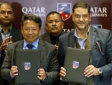 ANFA President Karma Tsering Sherpa and Qatar Airways Nepal Country Manager Mohamed El Emam (right) displaying the exchanged documents after signing the partnership agreement today- Wednesday at ANFA Complex.
