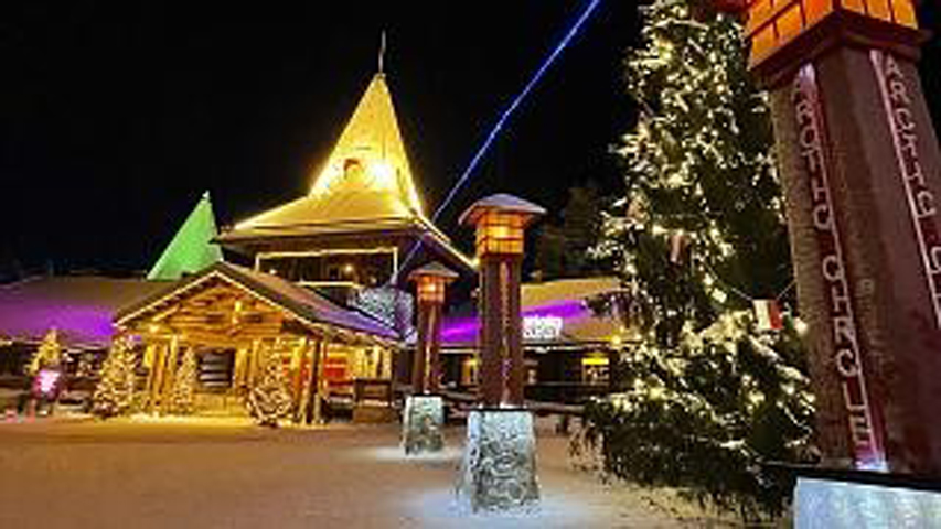 The Santa Claus Village tourist attraction lit with festive lights early in the morning in Rovaniemi, Finland. James Brooks/AP Photo
