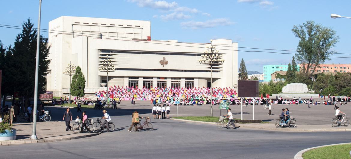 People walk on the streets of Pyongyang, in the Democratic People’s Republic of Korea. Micha Brandii/Unsplash 