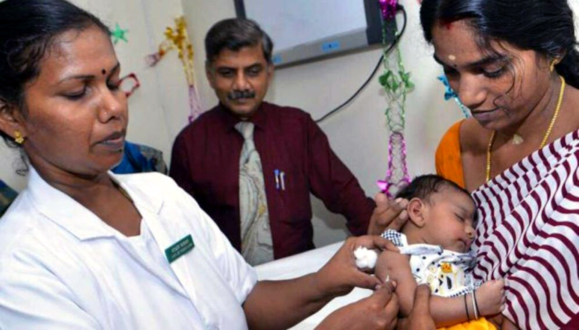 A child receives a polio vaccine. Photo: Smartshiva1988