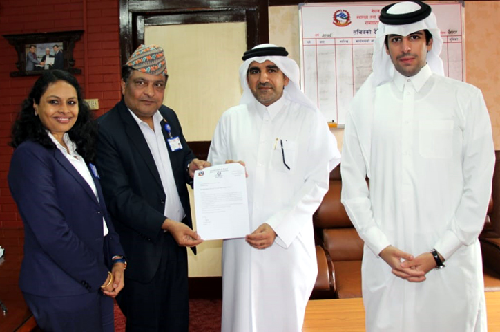 Ambassador of Qatar to Nepal Yousuf Bin Mohamed Ahmed Al-Hail (second from right) handing over the documents related to the oxygen tanker to the Secretary at the Ministry of Health and Population of Nepal Government Dr. Roshan Pokharel (second from left)) amidst a function organized in the Ministry of Health and Population in capital Today-Wednesday (May 11). Also seen in the picture is the First Secretary at the Qatari Mission Khalid Abdullah ALebrahim. 