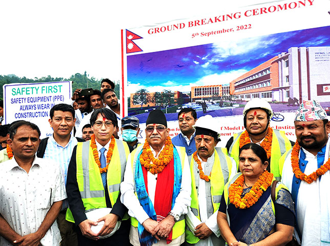 A photo was clicked after groundbreaking ceremony in which KOICA Nepal Director Sunghoon Ko, Chairman of Nepal Communist Party-Maoist Pushpa Kamal Dahal-Prachanda, ex minister Pokharel and Minister of Education, Science and technology Devendra Poudel (from left- all with yellow jacket) are seen.