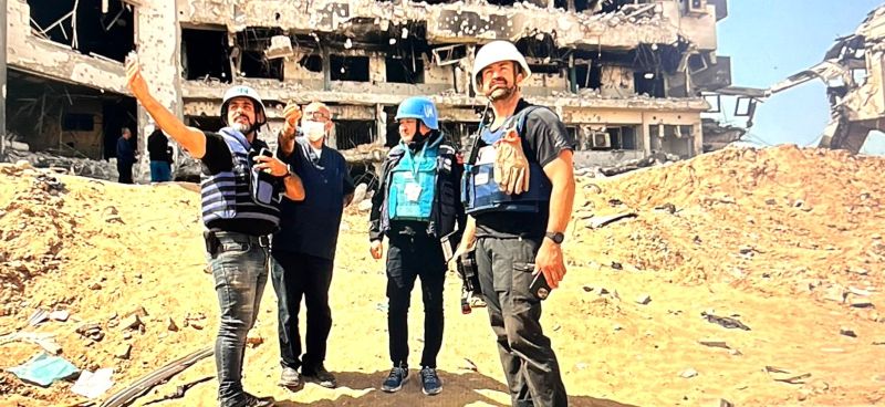 FILE PHOTO: UN staff with hospital director beside the ruins of the Al-Shifa Hospital in Gaza, April 2024. Image credit WHO