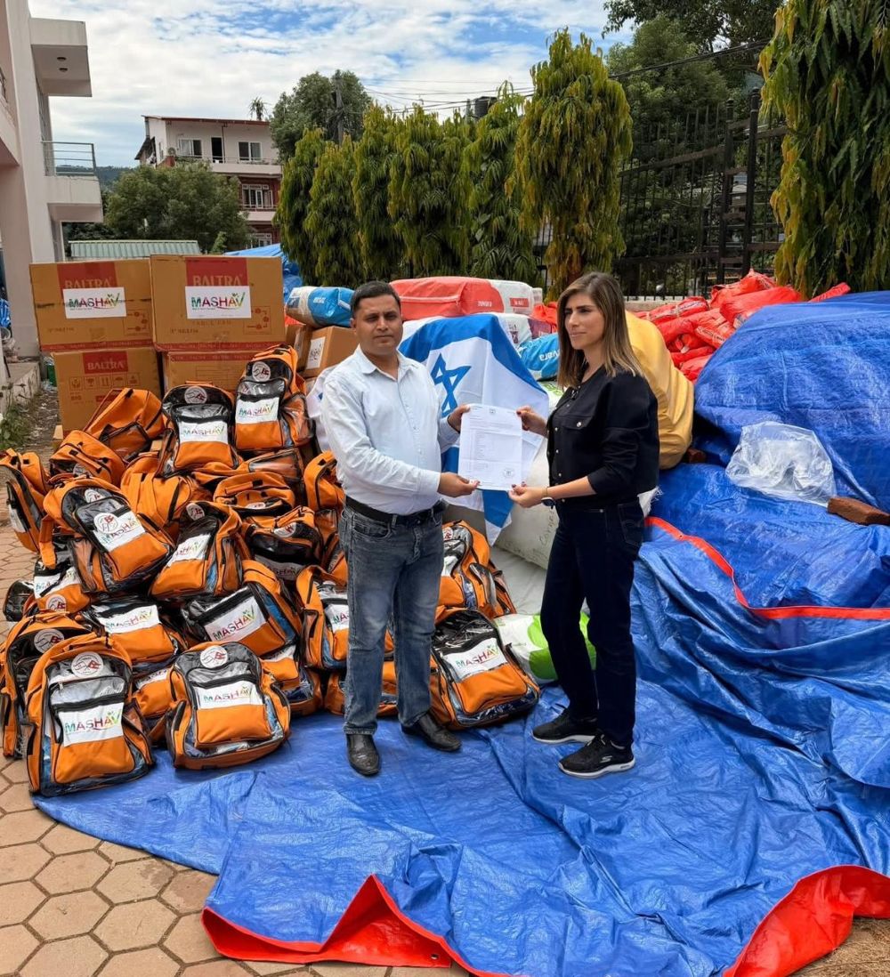 Ms. Janan Bebar, Chargé d'Affaires a.i. of the Embassy of Israel in Nepal handing over emergency humanitarian assistance to the communities affected by the devastating floods in Ward No. 2, Trishuli, Bidur Municipality, Nuwakot.