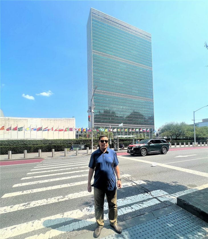 The writer is in front of the United Nations building in New York where the 81st General Assembly session begins today.