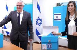 Ambassador of Israel to Nepal H.E. Shmulik Arie Bass (left) and Deputy Chief at Mission Ms. Janan Bebar (right) casting their votes voting for a new Israeli parliament at the Embassy of Israel in Nepal Thursday-15 October. Embassy Photo