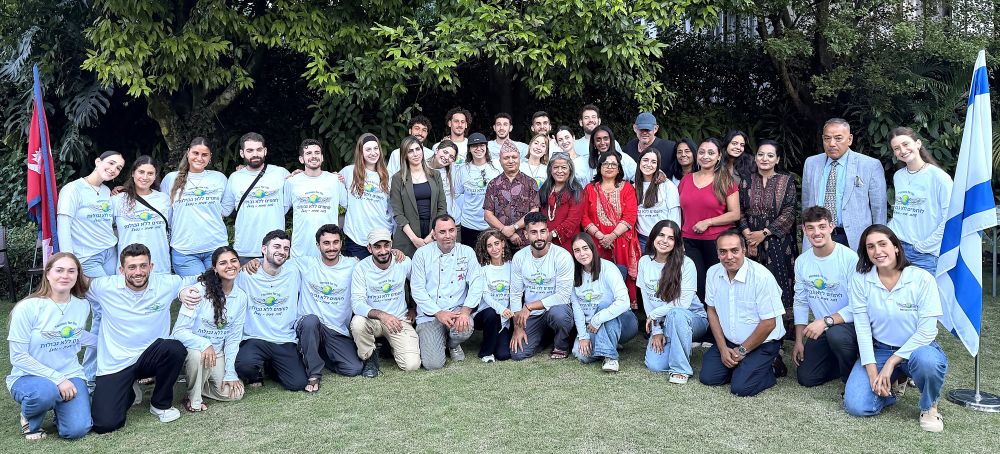Chargé d'Affaires a.i. of the Embassy of Israel, Ms. Janan Bebar (seventh from left at the standing row) along with other Nepalese with the Israeli volunteers. Israel Embassy photo.